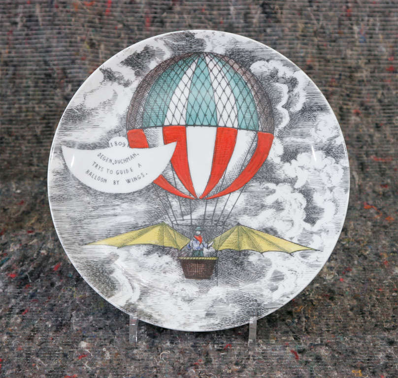 A wonderful set of 9 porcelain plates by Piero Fornasetti.

“Palloni”

The backgrounds lithographically printed and coloured with clouds and Mongolfieres Balloons.

Marked to back.
Italy 1955